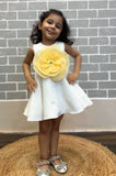 White dress with Yellow organza flower