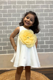 White dress with Yellow organza flower