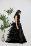 BLACK SATIN EMBOIDERED GOWN WITH DETACHABLE RUFFLE DRAPE
